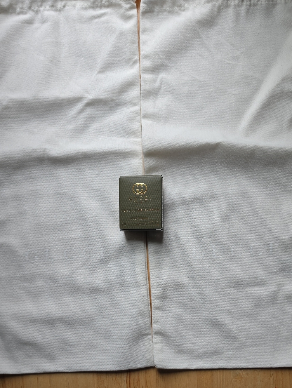Two Gucci Dust Bags With GUCCI Guilty